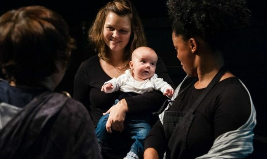 Audrey Dwyer, (right) one of the performers interacts with a young audience member